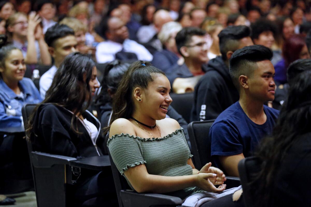 Stephanie Martinez, 16, a junior at Panorama High, along with other students listens to Lin-Manuel Miranda answer questions.