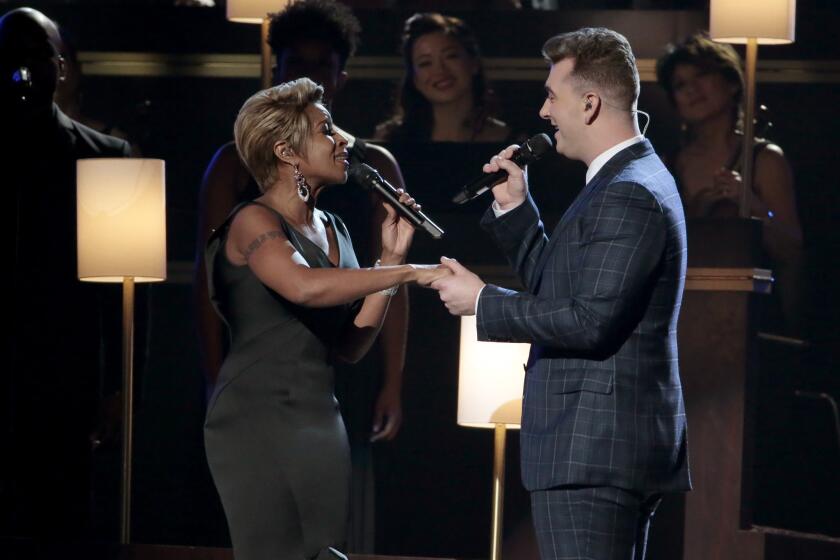 Mary J. Blige and Sam Smith perform at the 57th Annual Grammy Awards, where Smith took home three top honors.