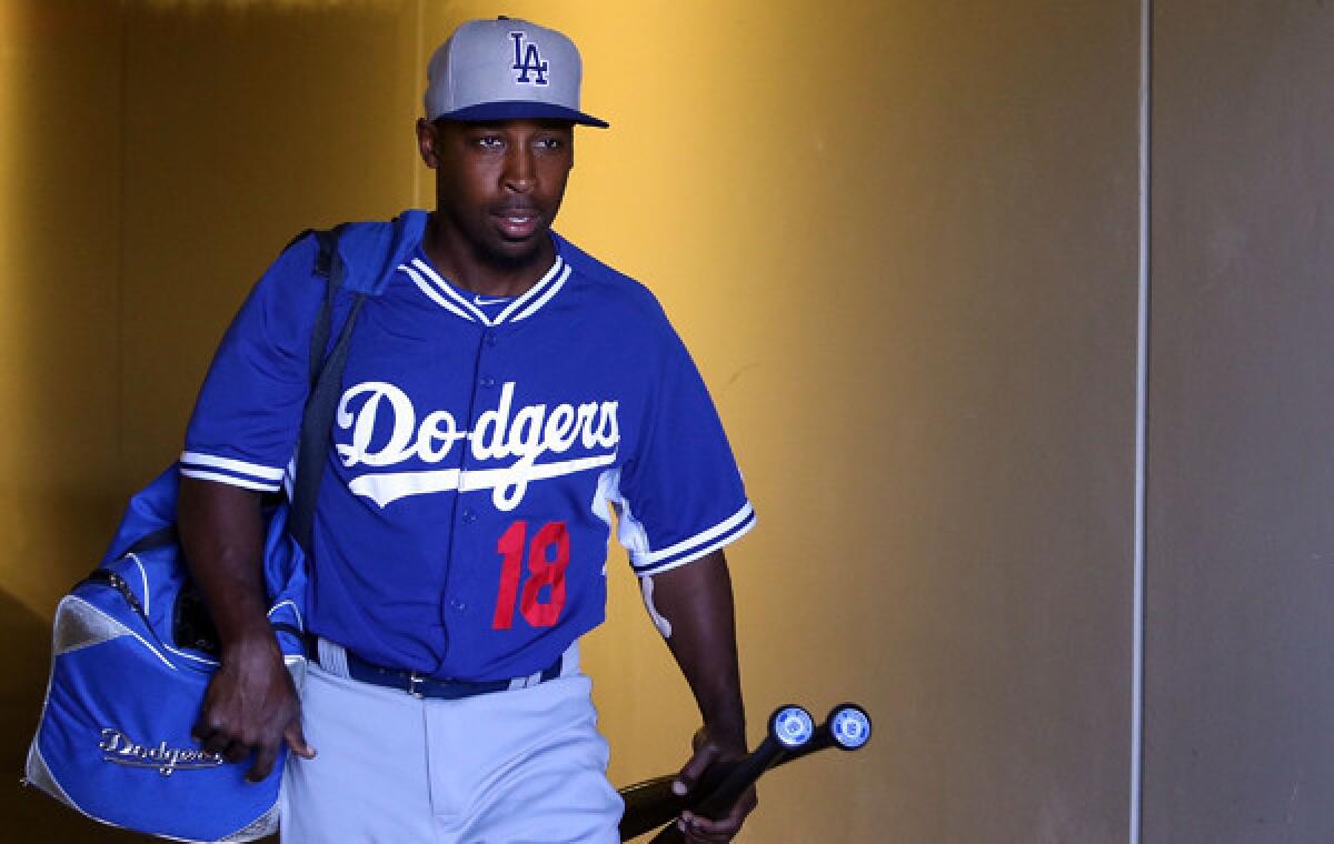 Dodgers utilityman Chone Figgins, who played eight seasons with the Angels before joining the Seattle Mariners in 2010, is excited to be playing in the majors again after taking a season off from baseball.