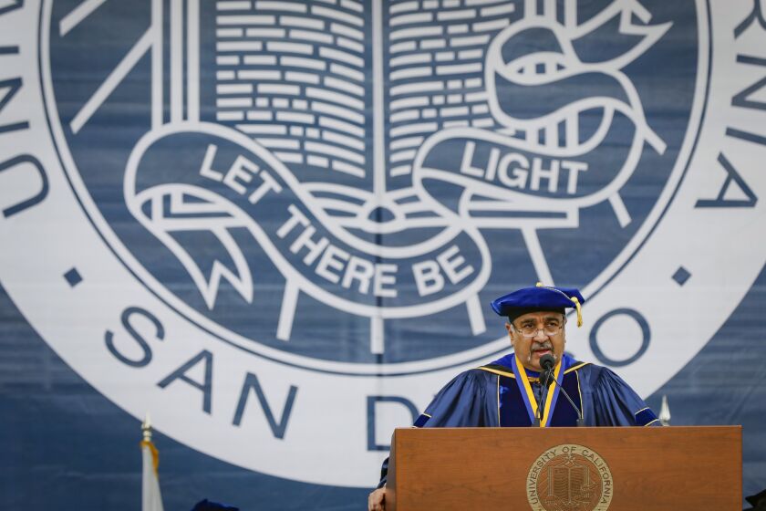 UC San Diego Chancellor Pradeep Khosla addresses graduates during an all campus commencement ceremony at RIMAC Field.