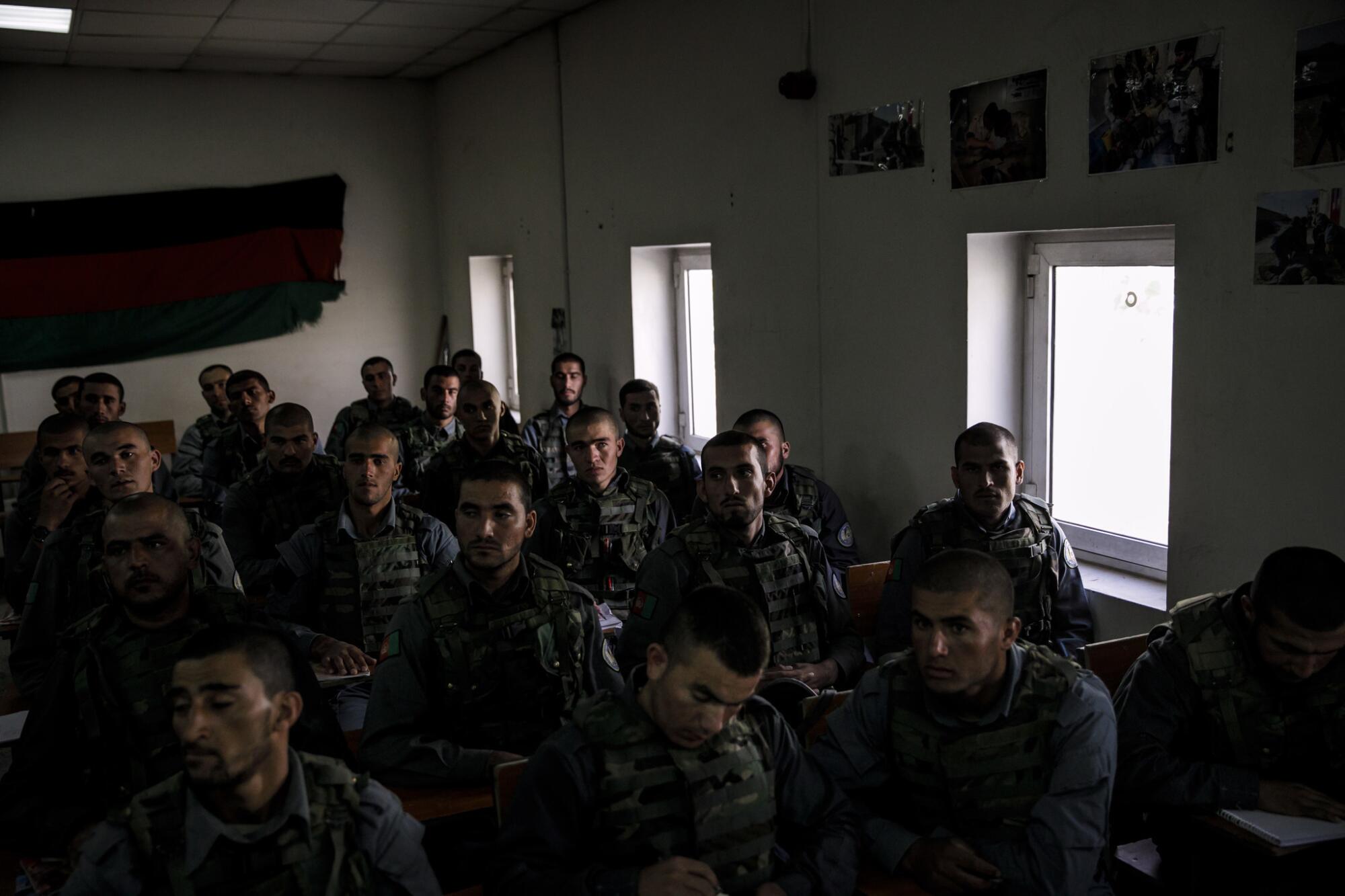 New recruits for Afghanistan's special forces learn about laws and regulations in December 2017. 
