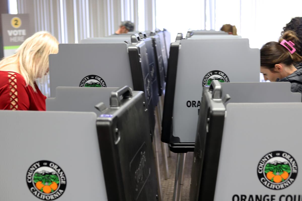 Voters cast their ballots at the Huntington Beach Civic Center on March 5.