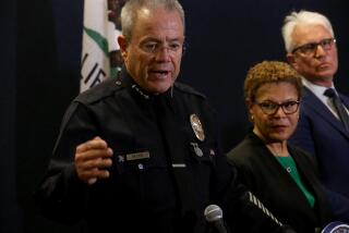 LOS ANGELES, CA - DECEMBER 1, 2023 - LAPD Chief Michael Moore, from left, with Los Angeles Mayor Karen Bass and Los Angeles District Attorney George Gascon, discusses the recent murders of three homeless men by a suspected serial killer at the LAPD Headquarters in downtown Los Angeles on December 1, 2023. (Genaro Molina / Los Angeles Times)