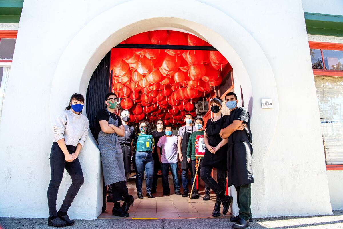 Vivian Ku, left, along with her staff at Today Starts Here