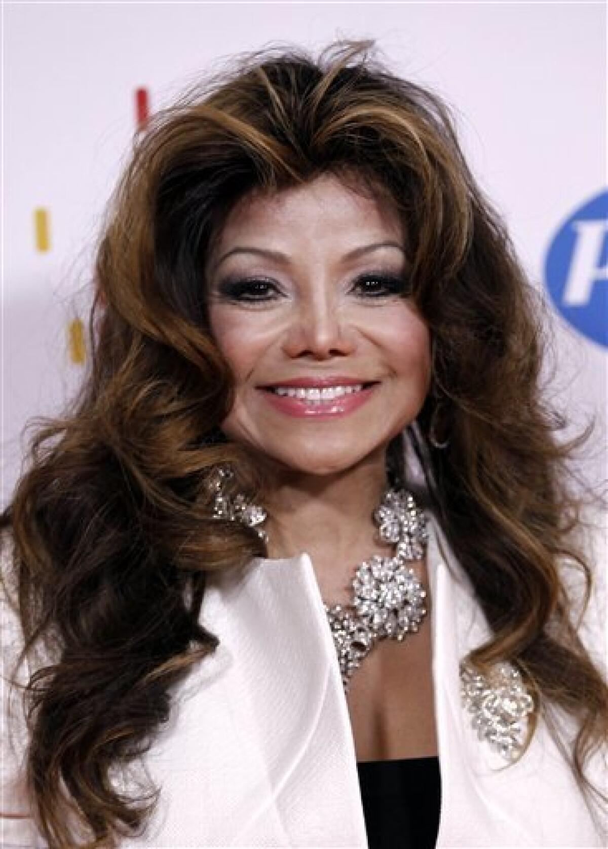 FILE - In this April 29, 2011 file photo LaToya Jackson arrives at the 18th annual Race to Erase MS Gala in Los Angeles. Latoya Jackson says her brother Michael spent the last months of his life frightened and on edge, convinced that he would be killed by people wanting to get access to his valuable music catalog. She makes the claims in her new book, "Starting Over," which also details her brother's struggle with prescription drugs and the day he died, as well as her own troubles, including an abusive marriage to her late ex-manager/husband Jack Gordon. (AP Photo/Matt Sayles, File)