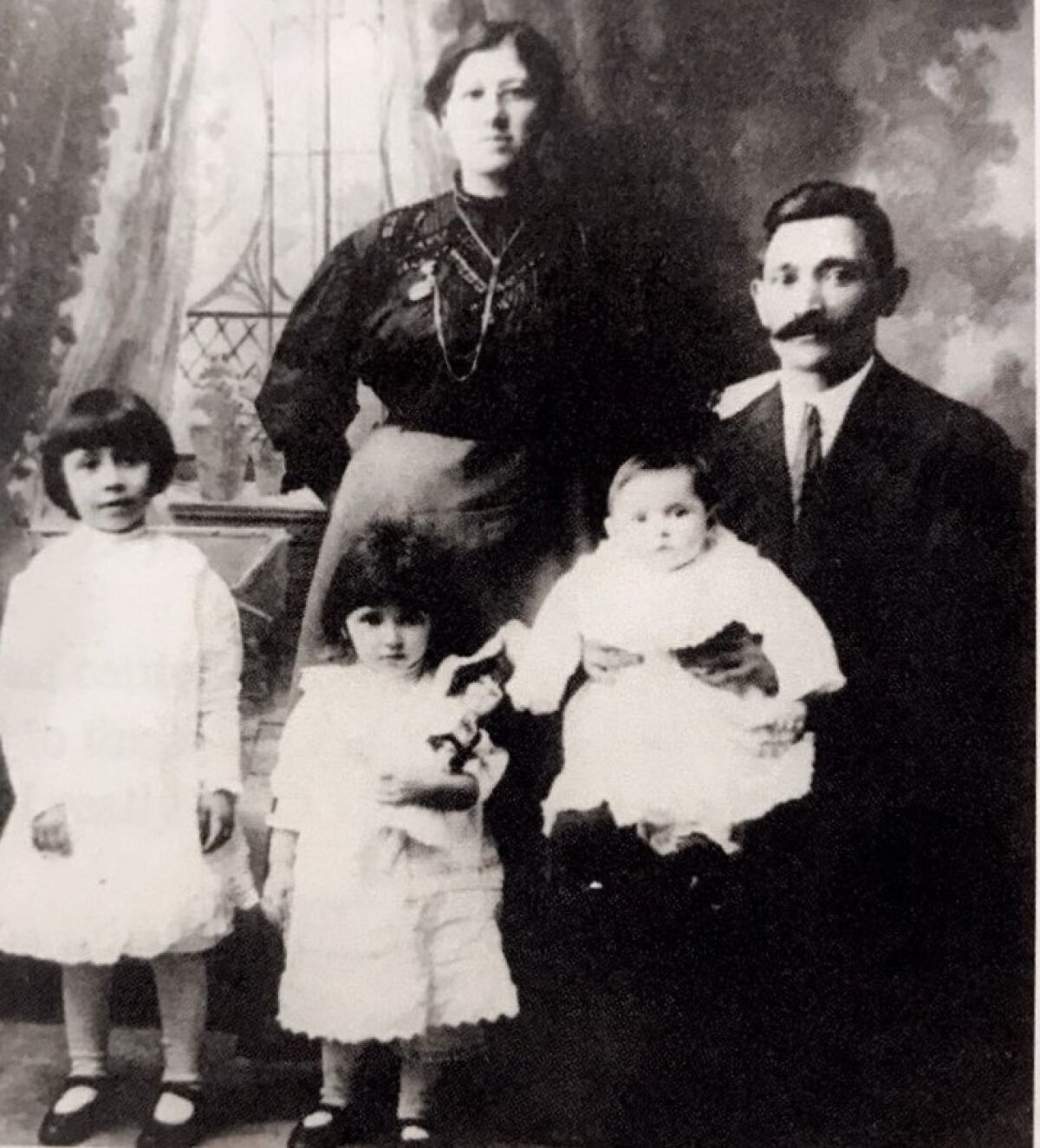 Sadie and Aaron Weiss with three of their five children