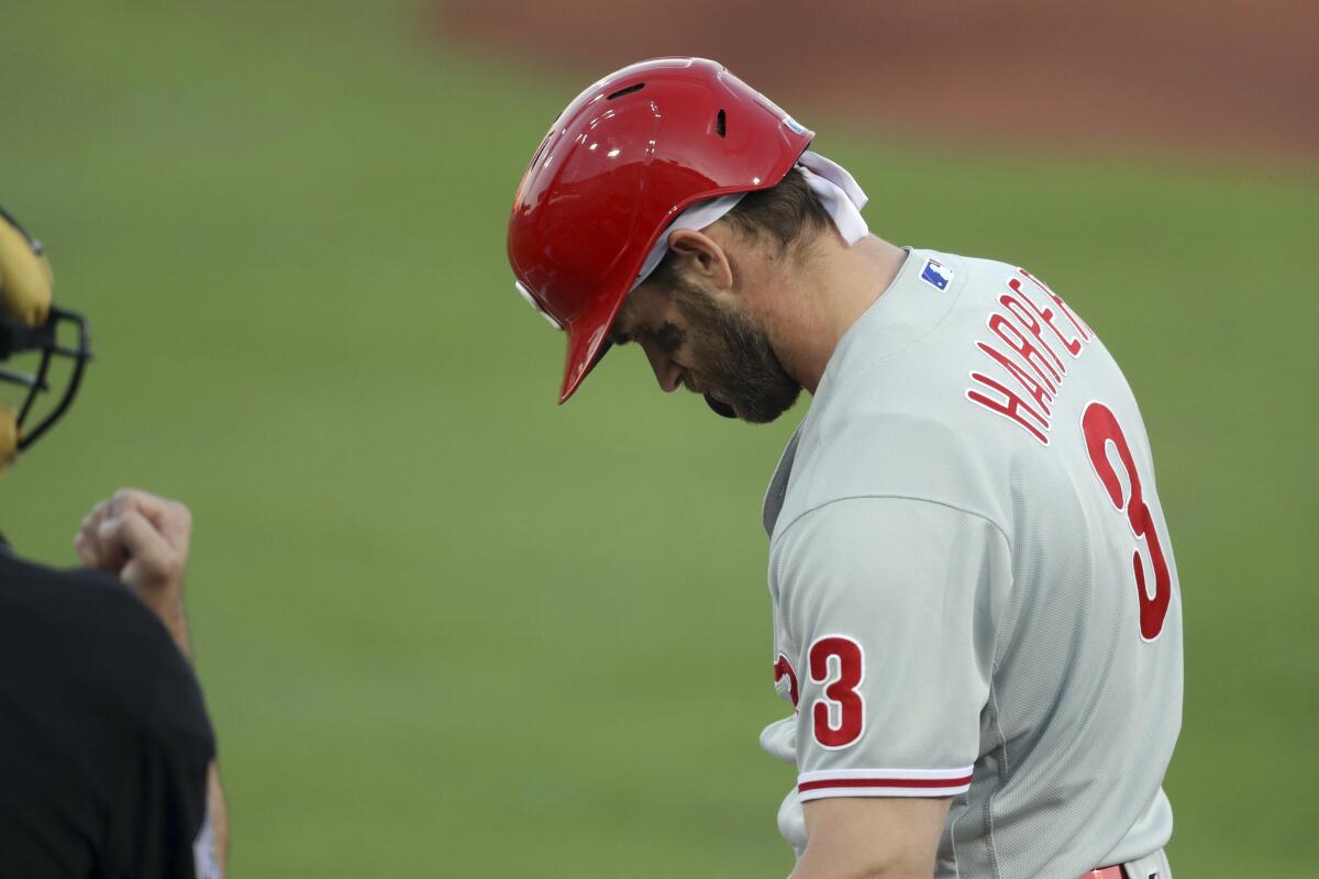 Phillies star Harper exits with sore shoulder, Jays win 4-0 - The