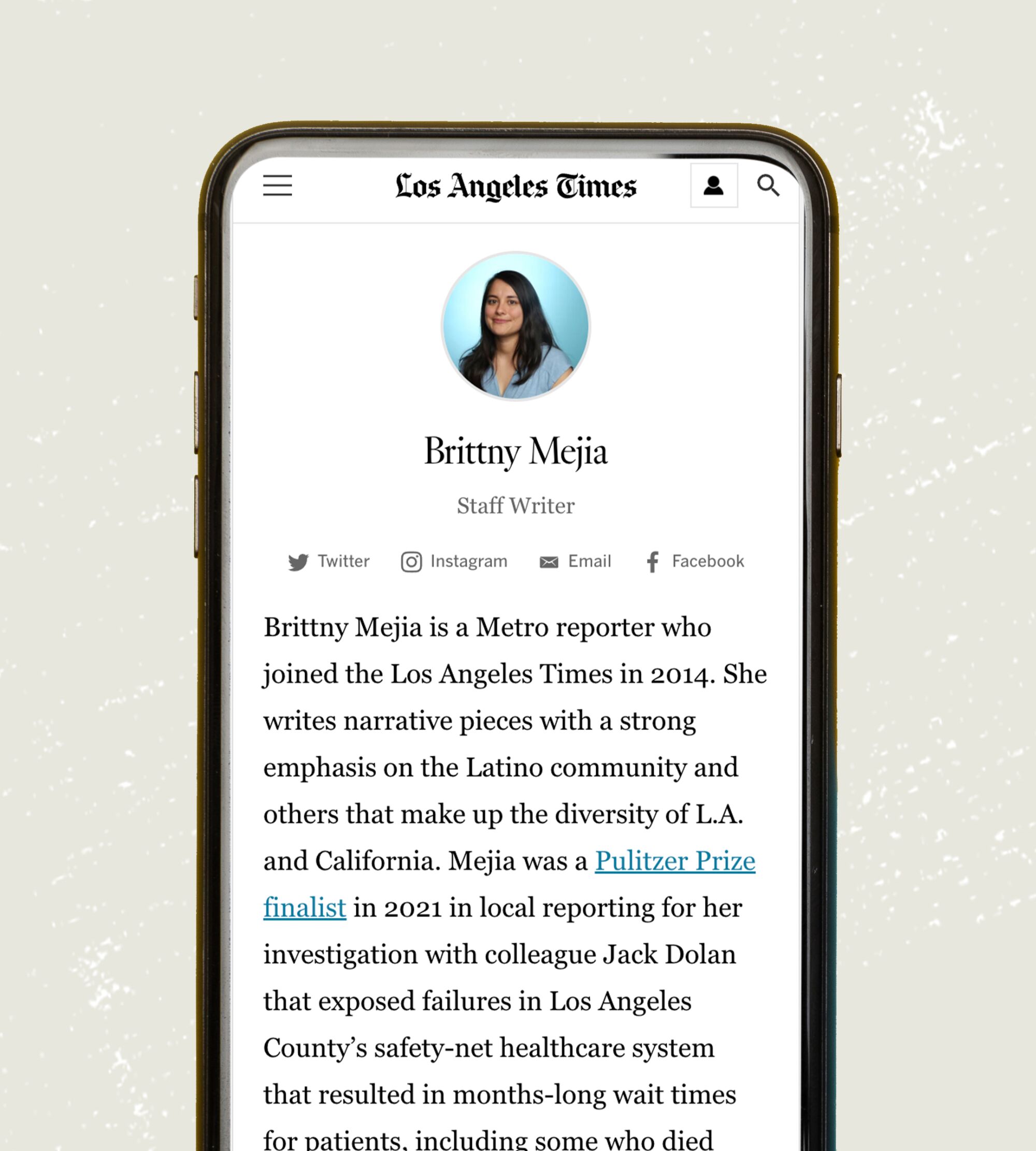 Brittny Mejia's LA Times bio on a phone screen. "Brittny Mejia is a Metro reporter who joined the Los Angeles Times in 2014."