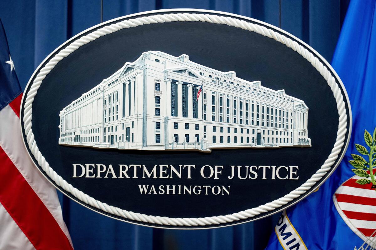 A U.S. Department of Justice sign is seen in Washington.