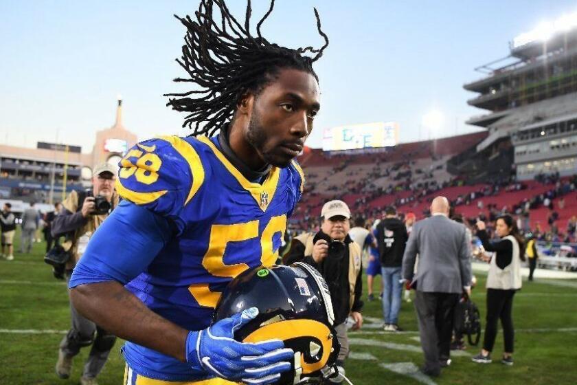LOS ANGELES, CALIFORNIA DECEMBER 30, 2018-Rams linebacker Cory Littleton jogs off the field after his team defeated the 49ers at the Coliseum. (Wally Skalij/Los Angeles Times)