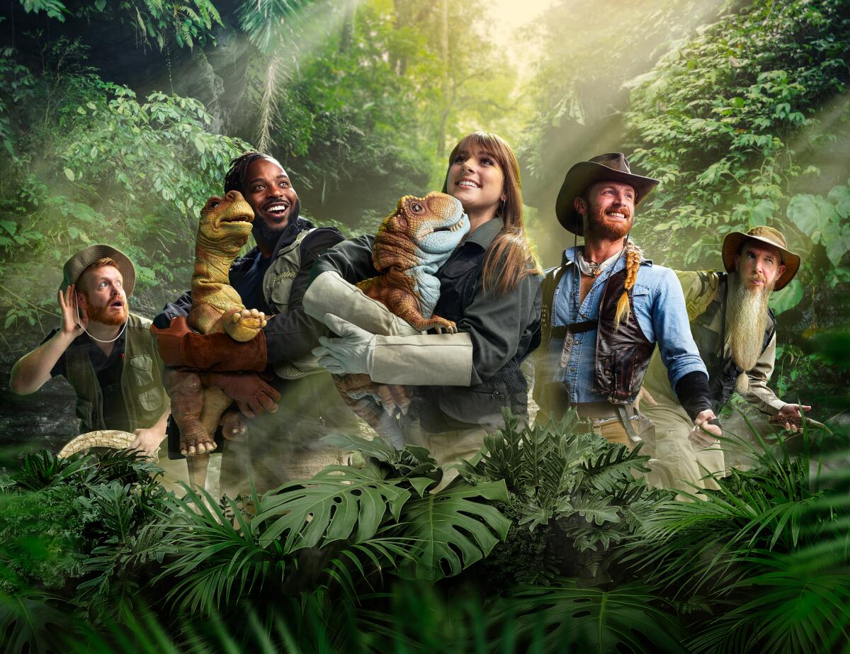 A group shot of Jurassic Quest dinosaur trainers, several of whom appear in an informational video while touring the exhibit.