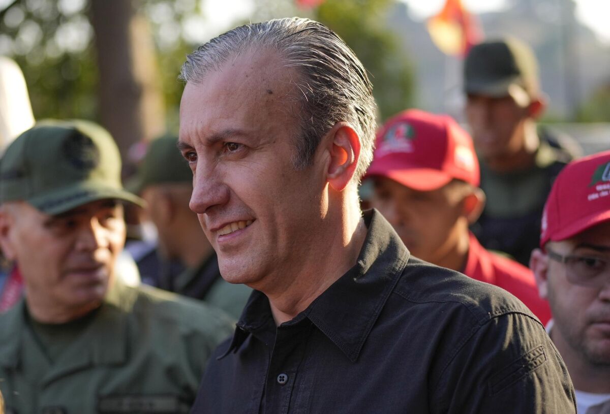 FILE - Venezuelan Petroleum Minister Tareck El Aissami arrives at the 4F military museum where late President Hugo Chavez is buried, during the activities marking the 10th anniversary of Chavez's death, in Caracas, Venezuela, Wednesday, March 15, 2023. El Aissami announced Monday, March 20, 2023, his resignation as officials investigate alleged corruption among public officials. (AP Photo/Matias Delacroix, File)