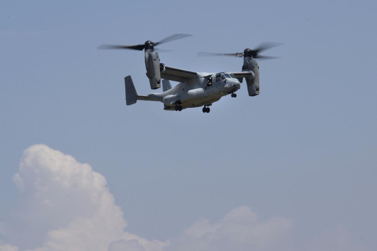 An MV-22 Osprey aircraft with 22 people aboard had a "hard-landing mishap" Sunday morning in Hawaii, the Marine Corps said. Above, an Osprey last week in Nepal.