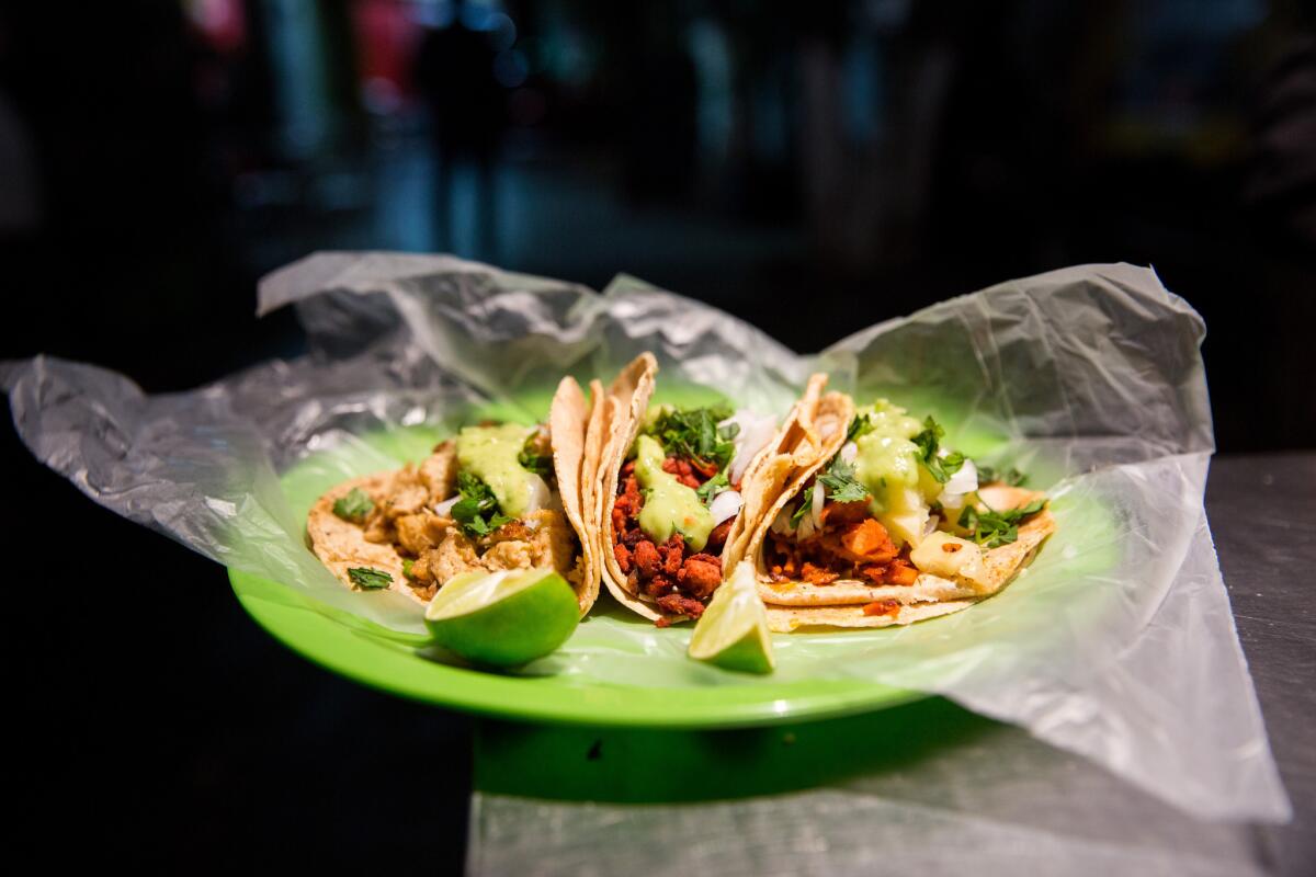 Vegan al pastor taco, vegan chorizo taco and taco con seitan al chimmichuri served at Por Siempre Vegana.