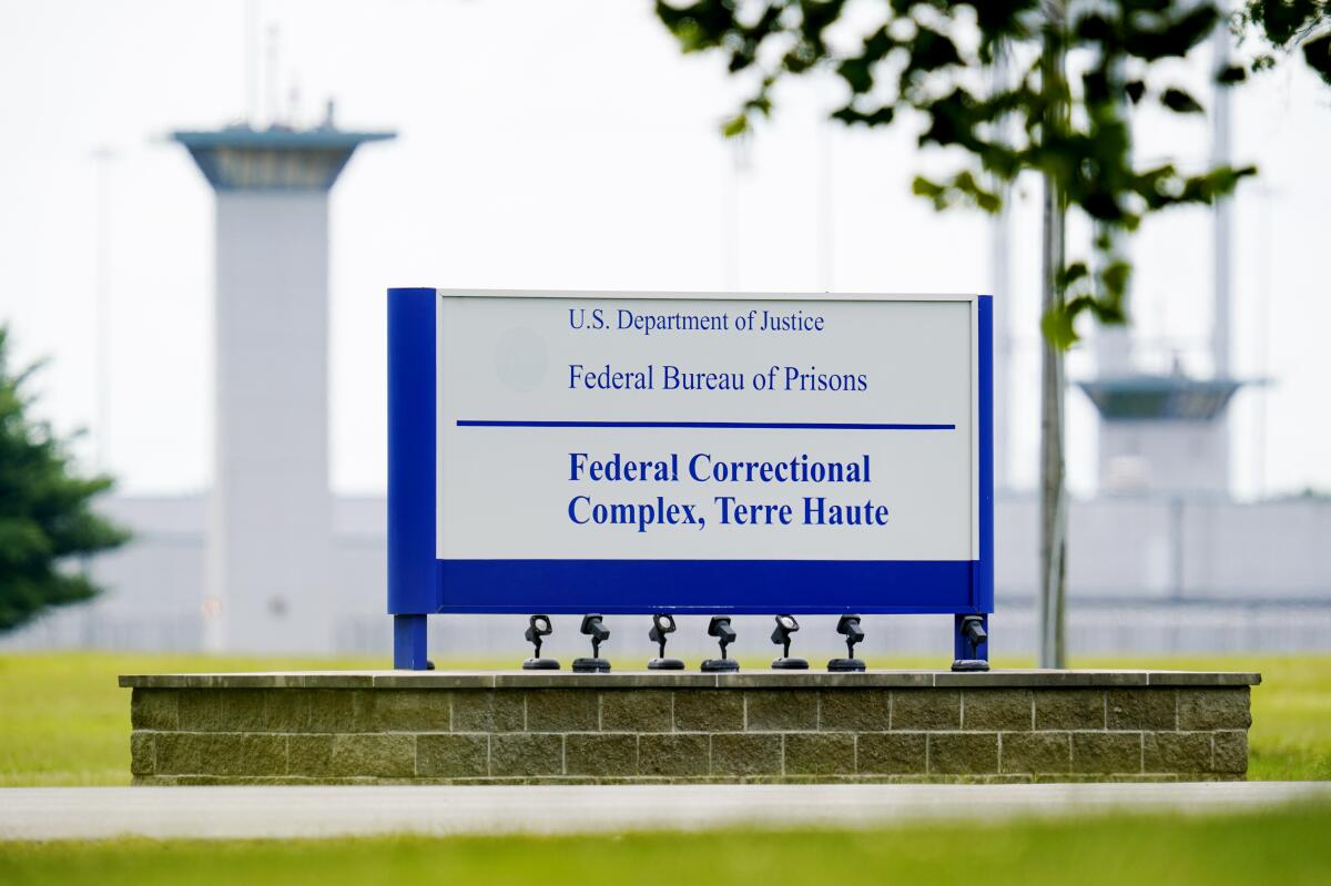 FILE - The federal prison complex in Terre Haute, Ind., Aug. 28, 2020. Days after the head of the troubled federal Bureau of Prisons said he was resigning amid increased scrutiny over his leadership, lawmakers have introduced a bill to require Senate confirmation for future agency directors — the same process used to vet leaders of the FBI and other federal agencies. (AP Photo/Michael Conroy, File)