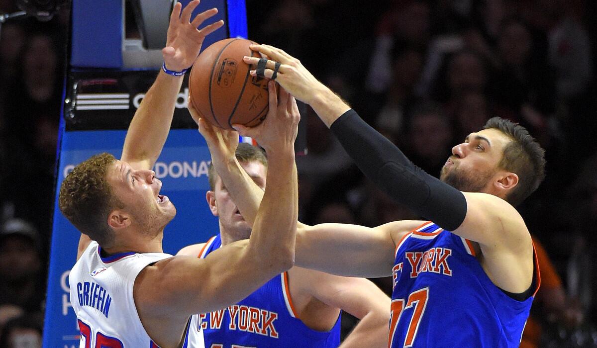 Clippers forward Blake Griffin and Knicks center Andrea Bargnani battle for a rebound during their game on Wednesday.
