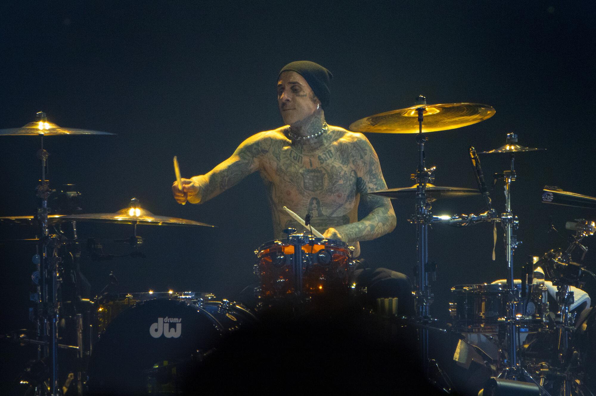 Drummer Travis Barker of blink-182 plays on Monday.