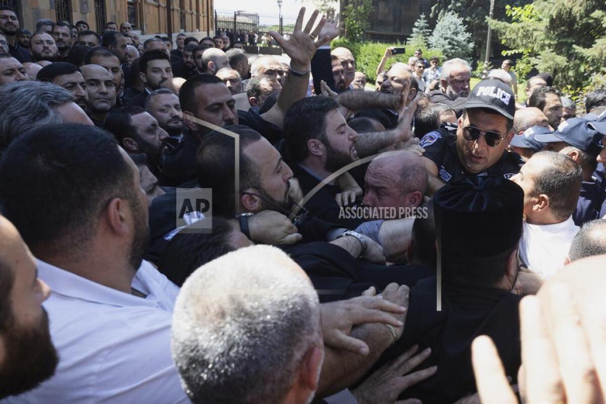 Armenian National Security Service officers clash with parishioners