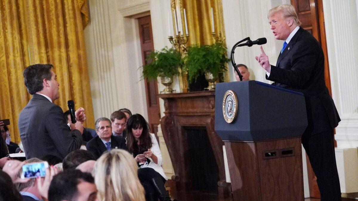 President Trump gets into a heated exchange with CNN chief White House correspondent Jim Acosta during a Nov. 7 news conference.
