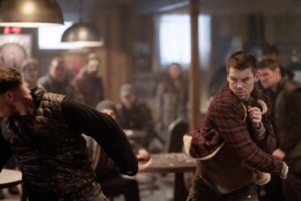 Brian J. Smith, right, stars in the new action drama "Treadstone" on USA/
