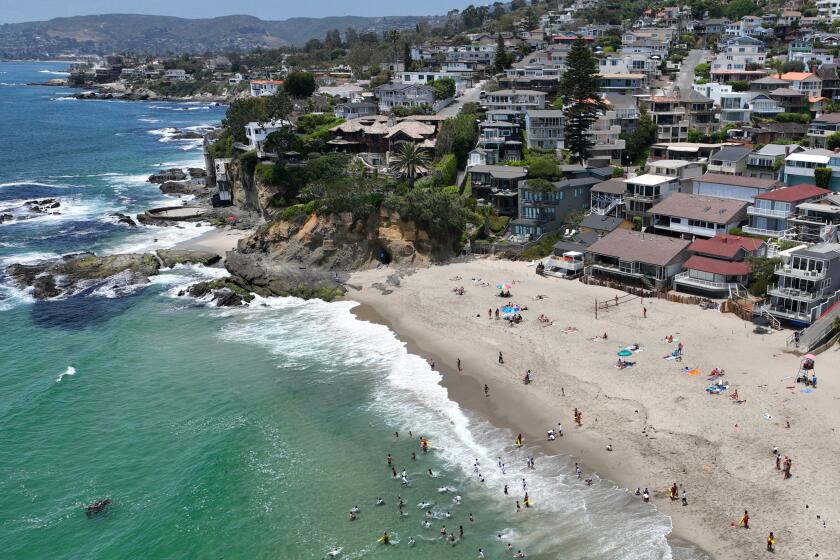 Laguna Beach, CA - June 20: Beach-goers enjoy Victoria Beach in Laguna Beach Thursday, June 20, 2024. 