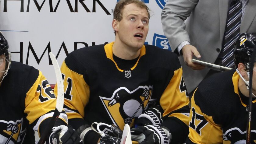 Daniel Sprong sits on the bench during a game between the Pittsburgh Penguins and Toronto Maple Leafs on Nov. 3.