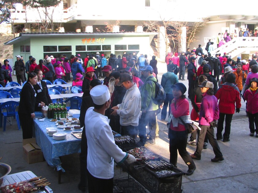 Vendors at Mt. Kumgang Resort in North Korea in November 2007, before it was closed after a South Korean tourist was shot and killed by the North Korean military for allegedly entering a forbidden zone. The resort was to be the site of reunions of families separated during the Korean War; those reunions were indefinitely postponed by North Korea on Saturday.
