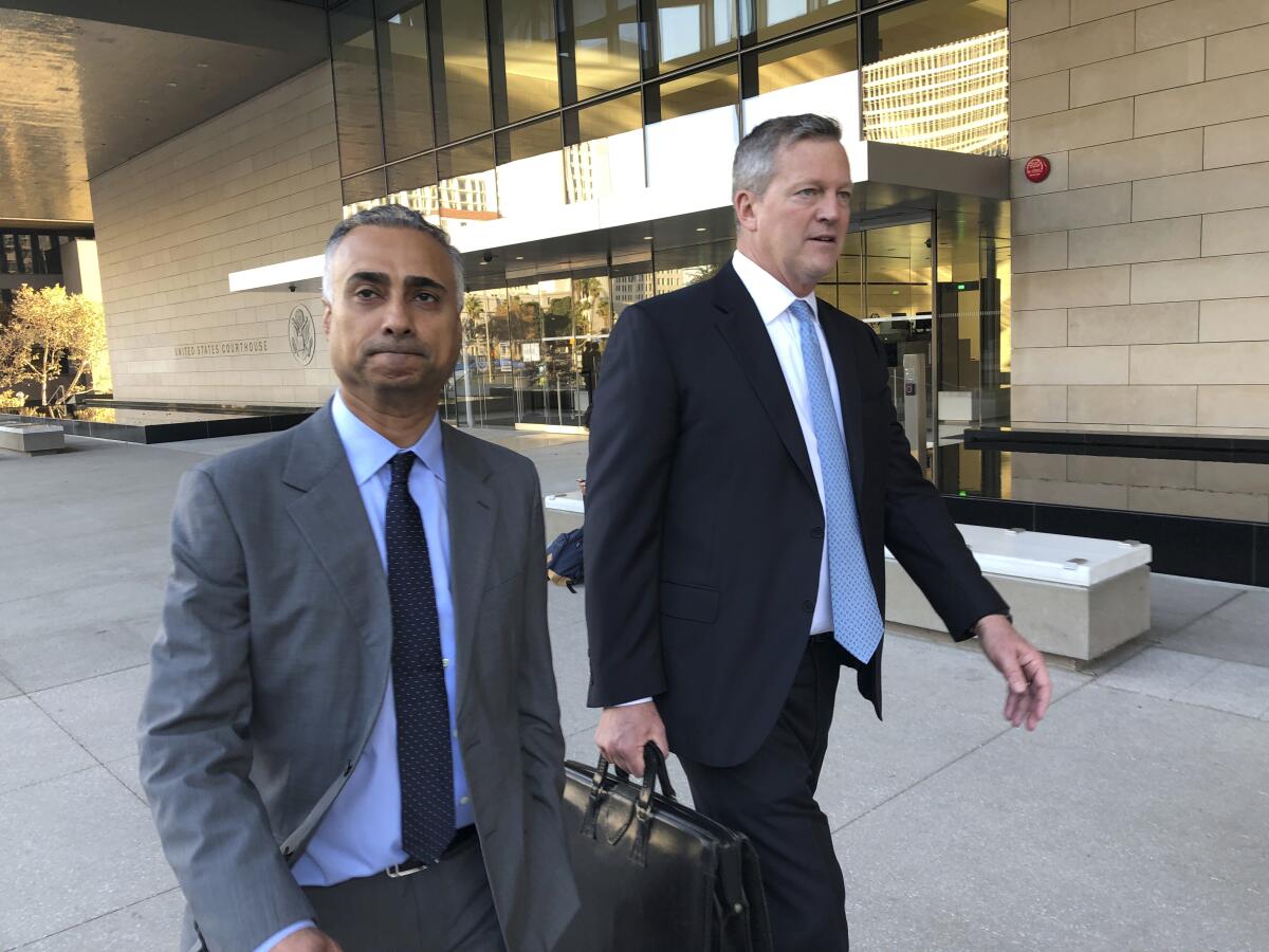 Imaad Zuberi leaves the federal courthouse in Los Angeles with his attorney Thomas O'Brien.