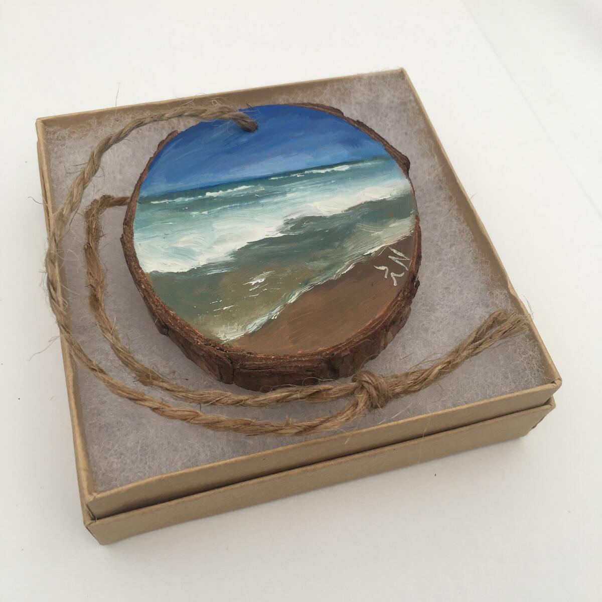 The California Beach Waves Painted Wood Slice Ornament.