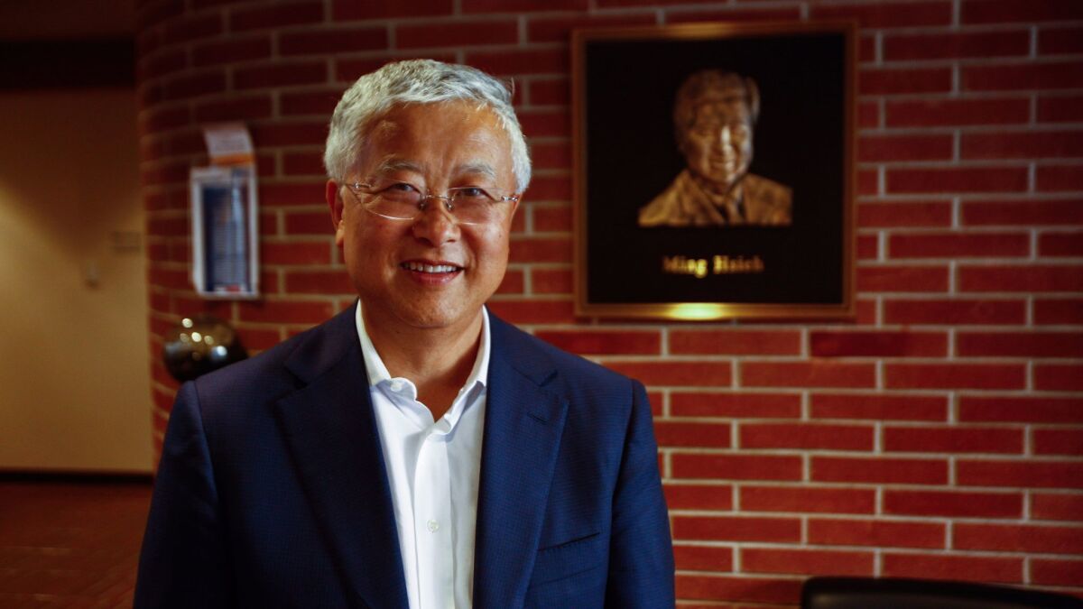 Ming Hsieh, who donated $35 million to his alma mater, USC, for its electrical engineering program and $50 million to fund research in nanomedicine for cancer treatments, stands in the university's Ming Hsieh Department of Electrical Engineering. (Claire Hannah Collins / Los Angeles Times)