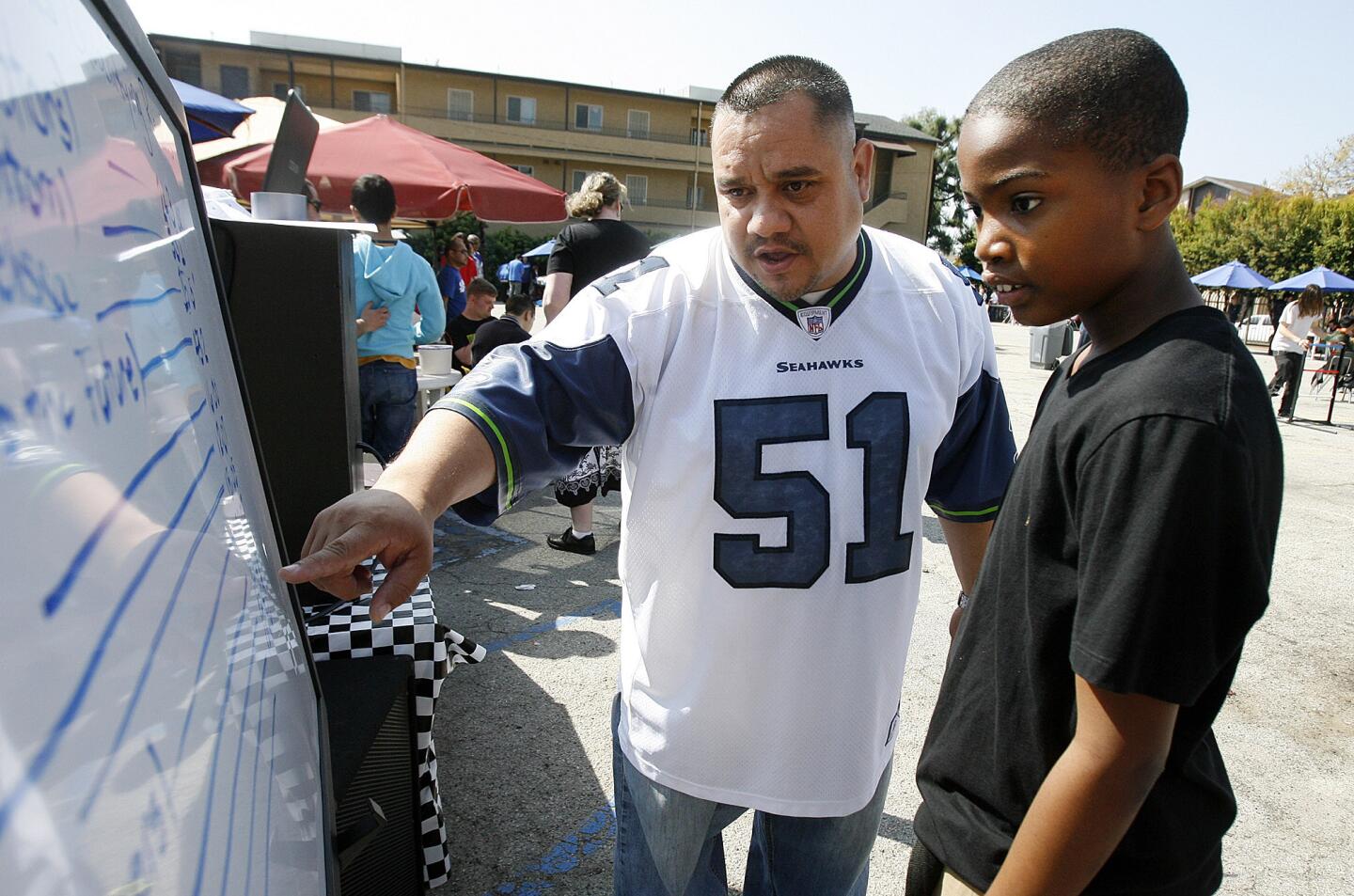 Photo Gallery: Custom-made cardboard cars raced at Tobinworld in Glendale