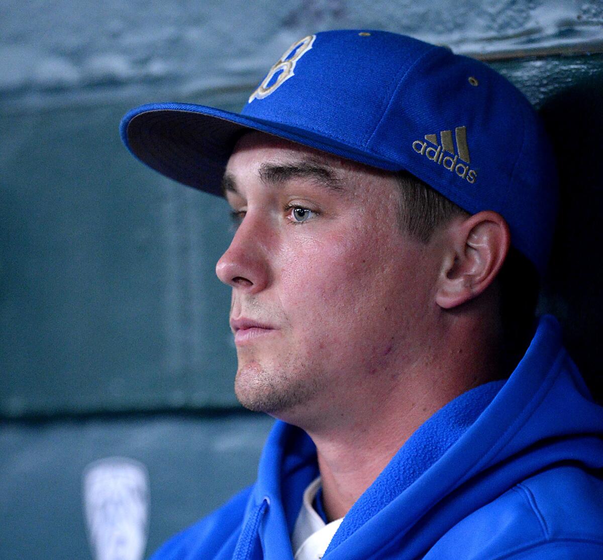 David Berg sits in the UCLA dugout during a 2015 game against Maryland 