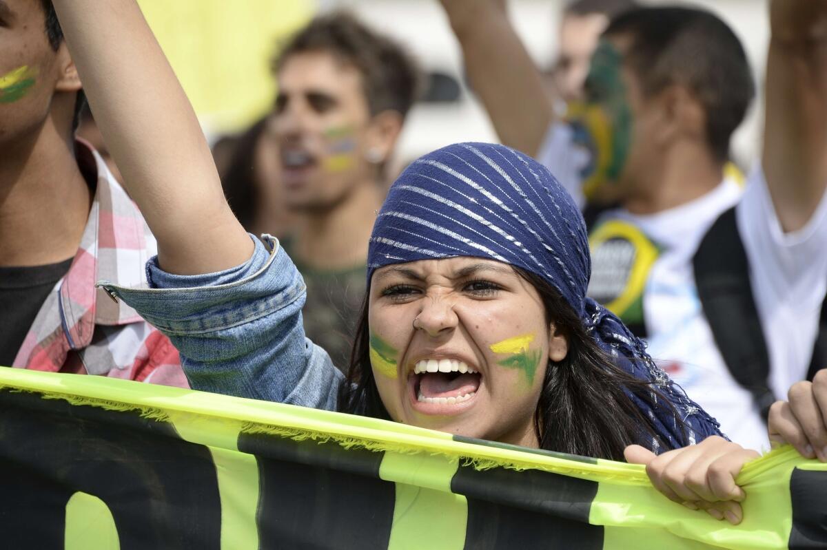 A protest outside Brazil's Congress building in Brasilia. Thousands took to the streets around Brazil to protest government corruption as the South American nation celebrated its independence day.