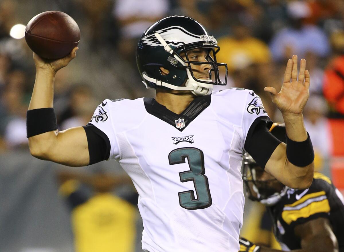 Mark Sanchez of the Philadelphia Eagles looks for an open receiver.