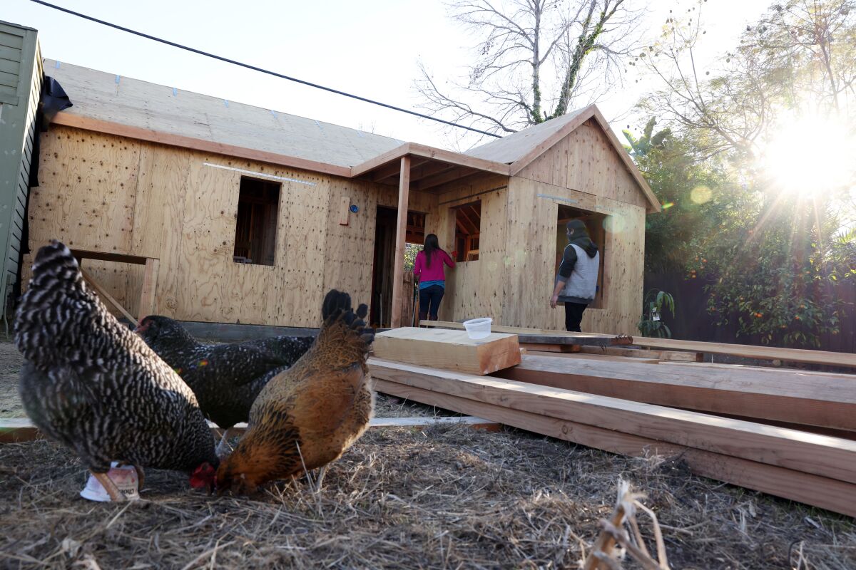 A house under construction as part of the Backyard Homes Project.