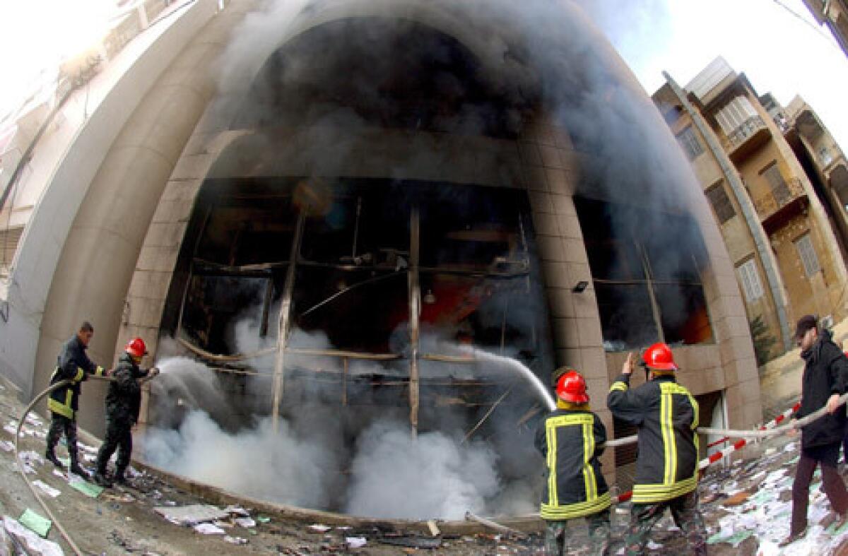 DANISH CONSULATE IN BERUIT: Lebanese firefighters extinguish the fire at the Danish consulate in Beirut, Lebanon, after thousands of Lebanese Muslim protestors stormed and set ablaze the building after the police failed to disperse them, witnesses said.