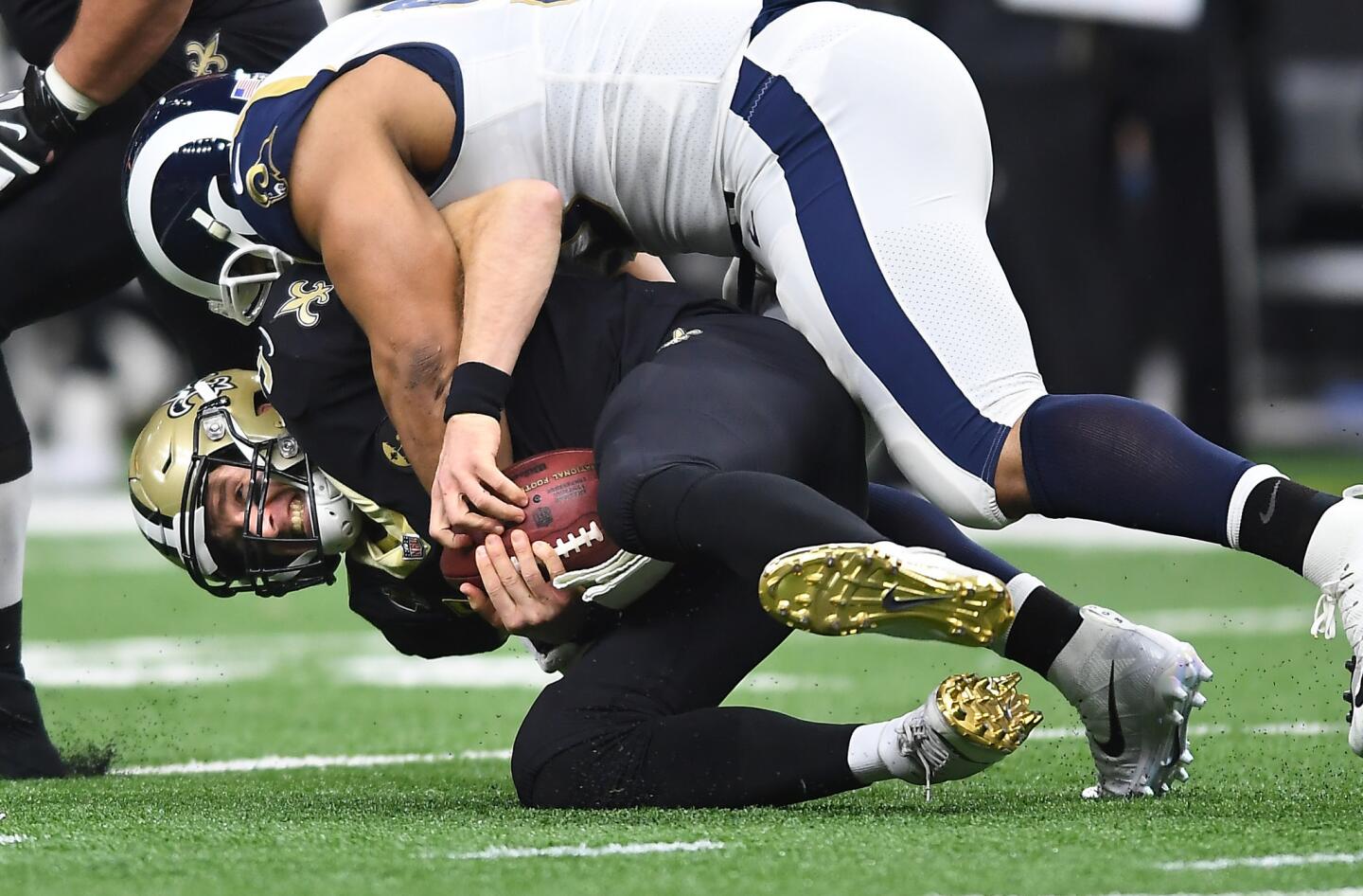 Rams defensive lineman Ndamukong Suh sacks Saints quarterback Drew Brees in the second quarter in the NFC Championship at the Superdome on Jan. 20.