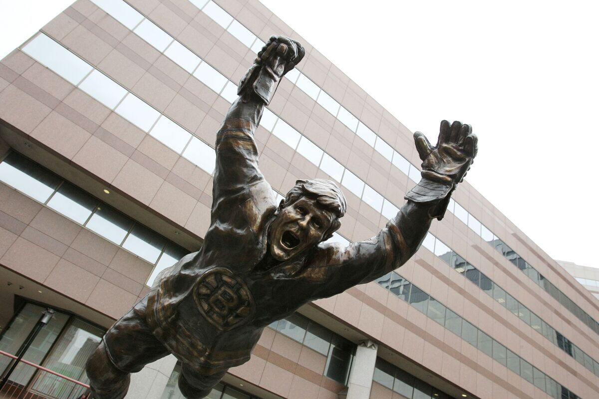 A statue of Bruins legend Bobby Orr is shown in front of TD Garden in Boston during the 2011 Stanley Cup playoffs.