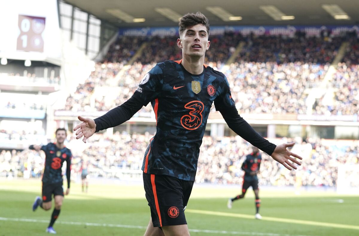 Chelsea's Kai Havertz celebrates scoring their side's second goal of the game during the English Premier League soccer match between Burnley and Chelsea at Turf Moor, Burnley, England, Saturday, March 5, 2022. (Martin Rickett/PA via AP)