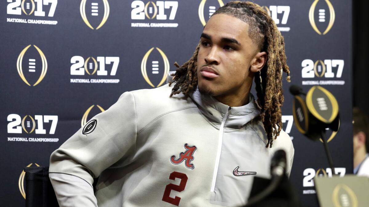 Alabama quarterback Jalen Hurts listens to a question during a media session for the College Football Playoff national championship game.