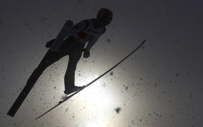 Austria's Jan Hoerl competes during the WSC Men's Large Hill Individual HS137 jumping event at the FIS Nordic World Ski Championships in Oberstdorf, Germany, Friday, March 5, 2021. (AP Photo/Matthias Schrader)