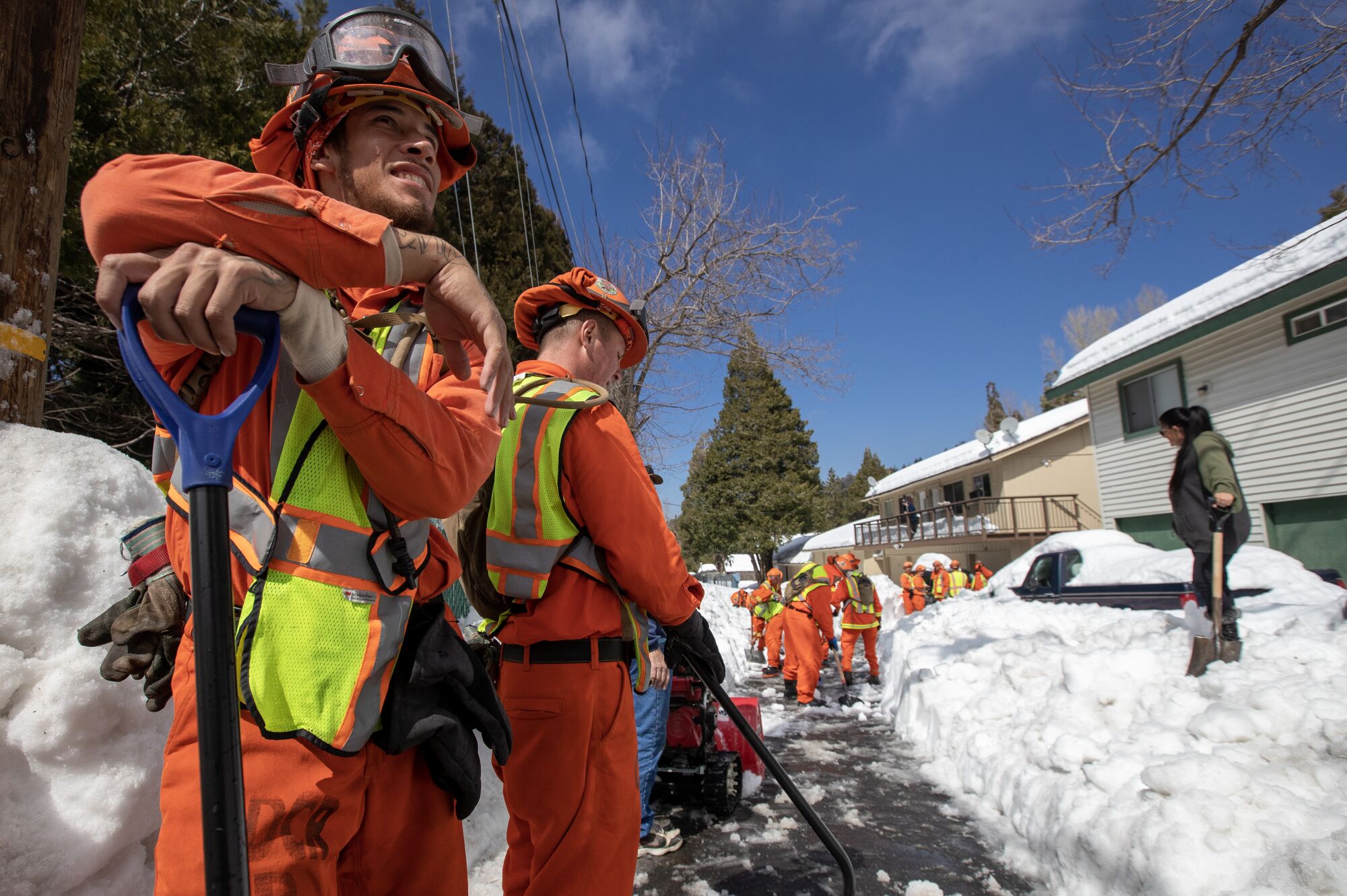 Prado Conservation Camp inmates help to dig out residents in Crestline.