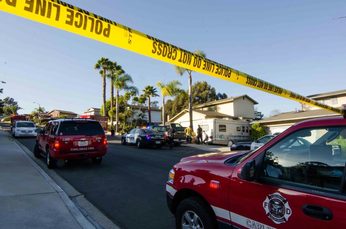 Police and firefighters at the scene of a Carlsbad homicide.