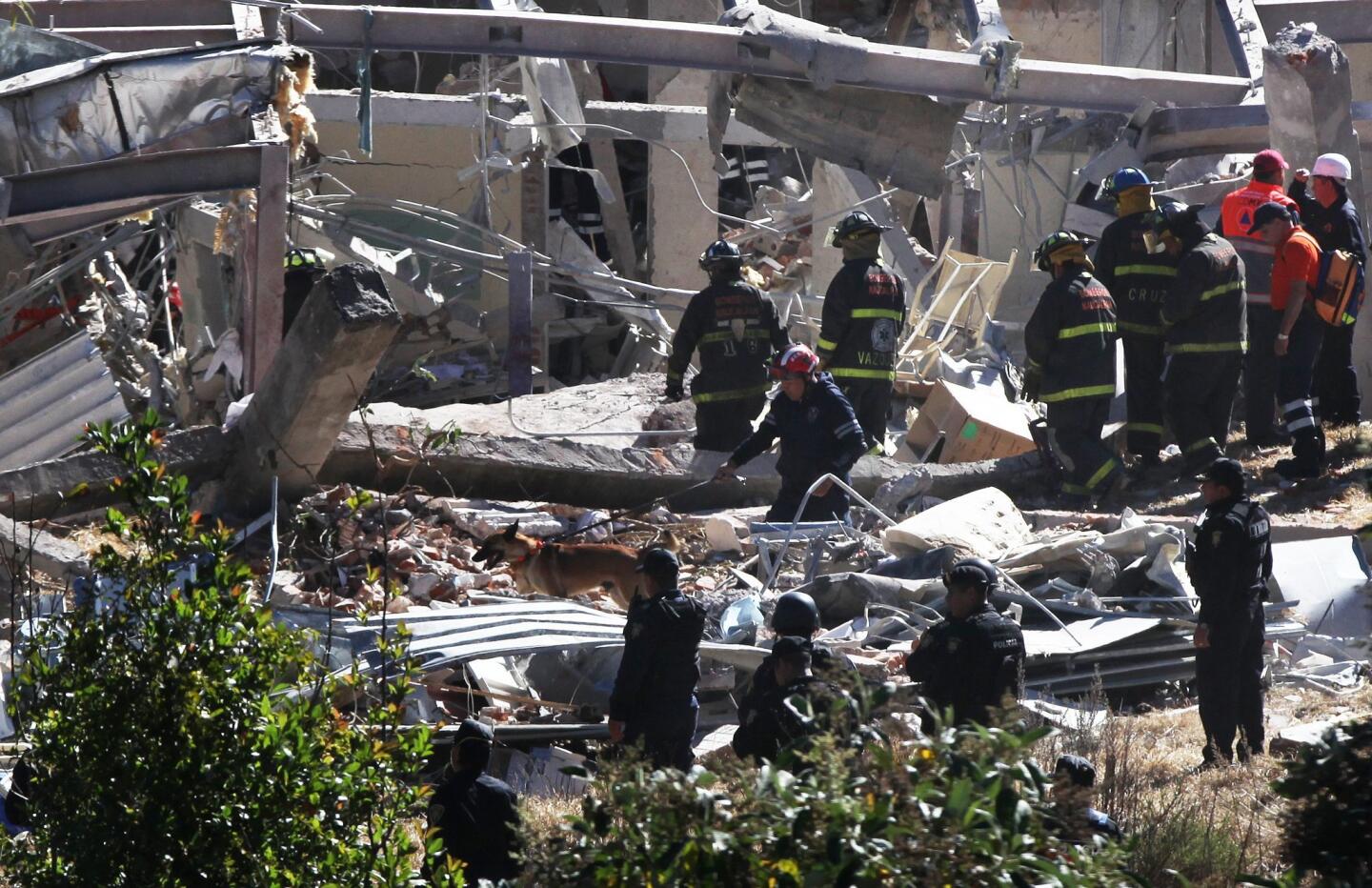 Rescue workers comb through the rubble of a Mexico City maternity and children's hospital after a gas tank truck explosion on Jan. 29.