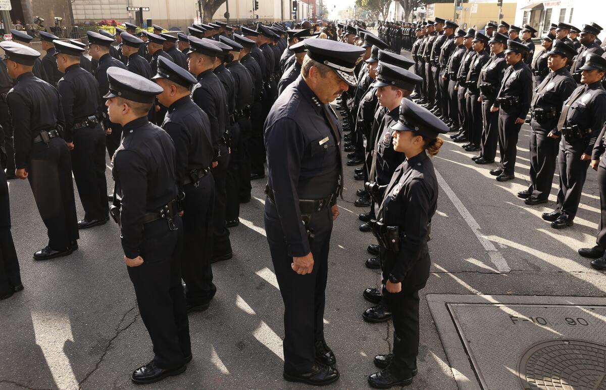 Chief Charlie Beck conducts his final inspection of LAPD officers on May 7.