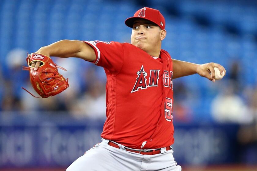 TORONTO, ON - JUNE 20: Jose Suarez #54 of the Los Angeles Angels of Anaheim delivers a pitch in the first inning during a MLB game against the Toronto Blue Jays at Rogers Centre on June 20, 2019 in Toronto, Canada. (Photo by Vaughn Ridley/Getty Images) ** OUTS - ELSENT, FPG, CM - OUTS * NM, PH, VA if sourced by CT, LA or MoD **