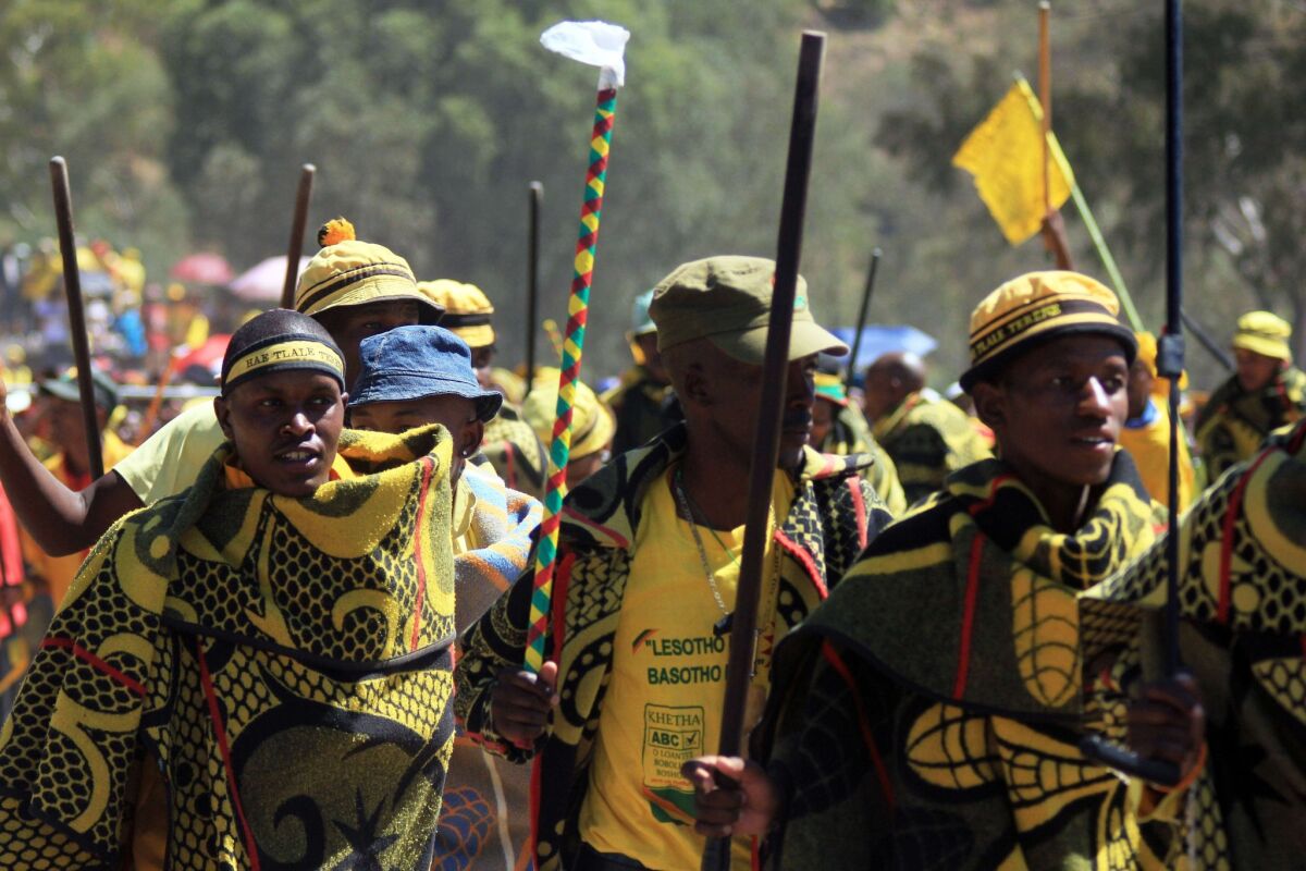 Singers of the traditional Basotho music dance during the last campaign rally of Lesotho's All Basotho Convention party in Maseru on Sunday.