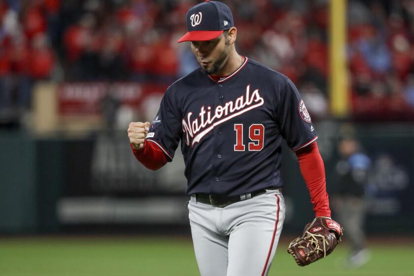 Washington Nationals starting pitcher Anibal Sanchez reacts after getting out of the sixth inning of Game 1 of the baseball National League Championship Series against the St. Louis Cardinals Friday, Oct. 11, 2019, in St. Louis. (AP Photo/Mark Humphrey)