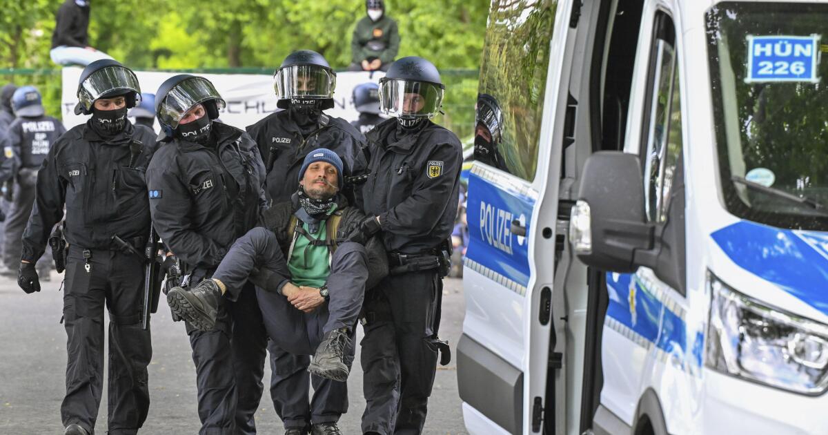 The police prevent environmental activists from storming the Tesla factory in Germany