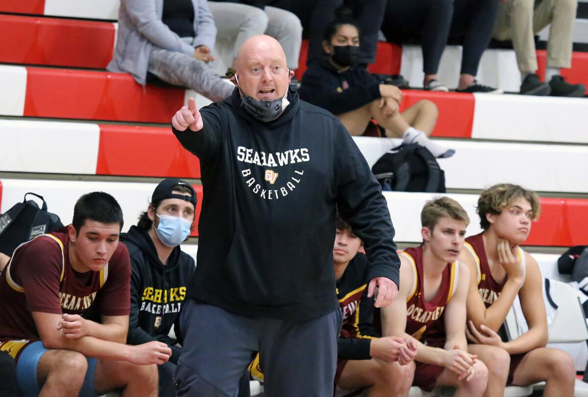 Ocean View coach Steve Harris instructs his team against Garden Grove in a Golden West League game on Tuesday.